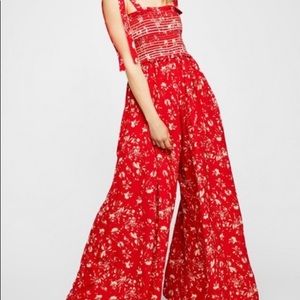 Free people red floral jumpsuit. Worn once. Excellent  condition.